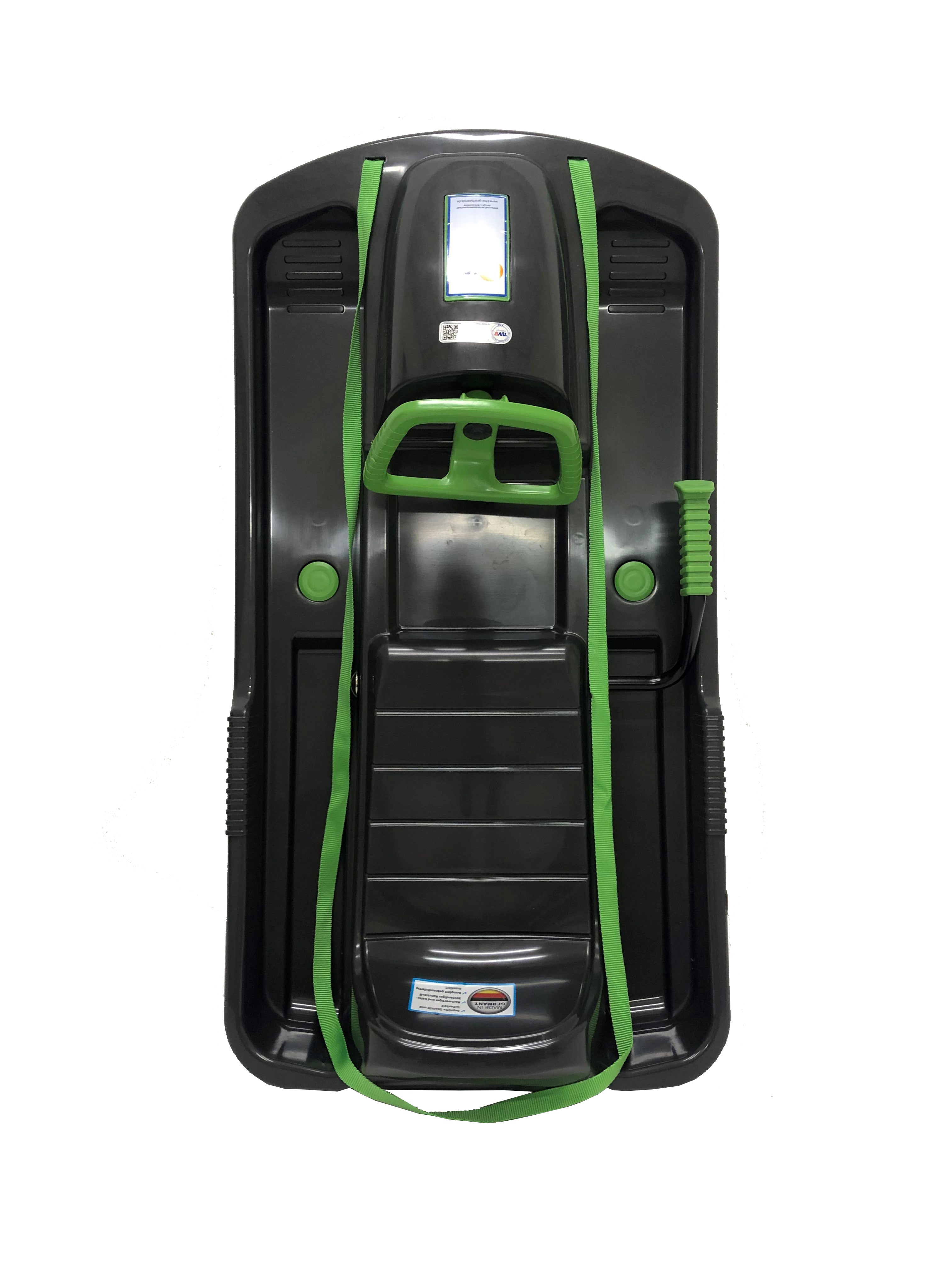 Aerial view of black sled with green highlights