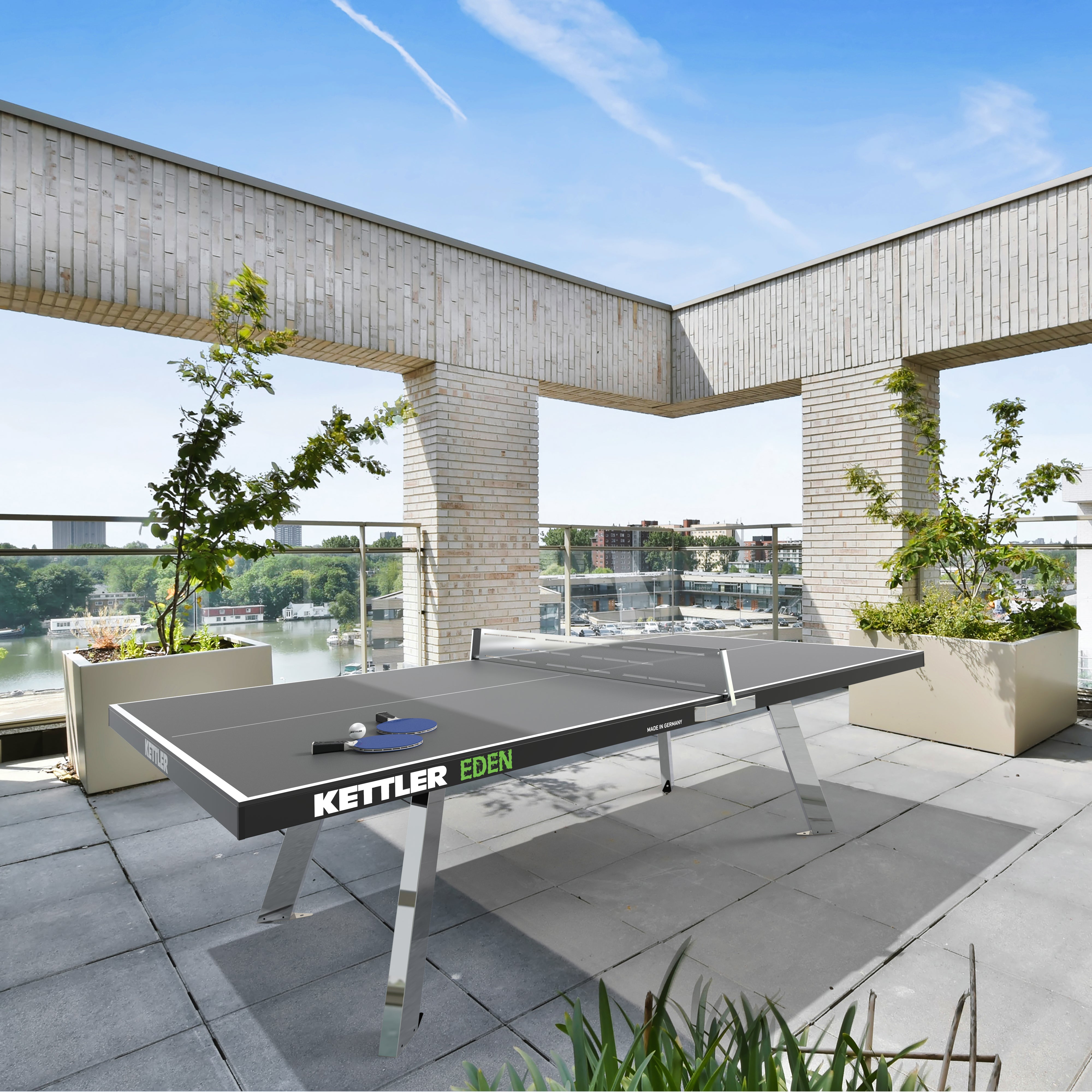 Stationary outdoor game table in commercial roof top setting
