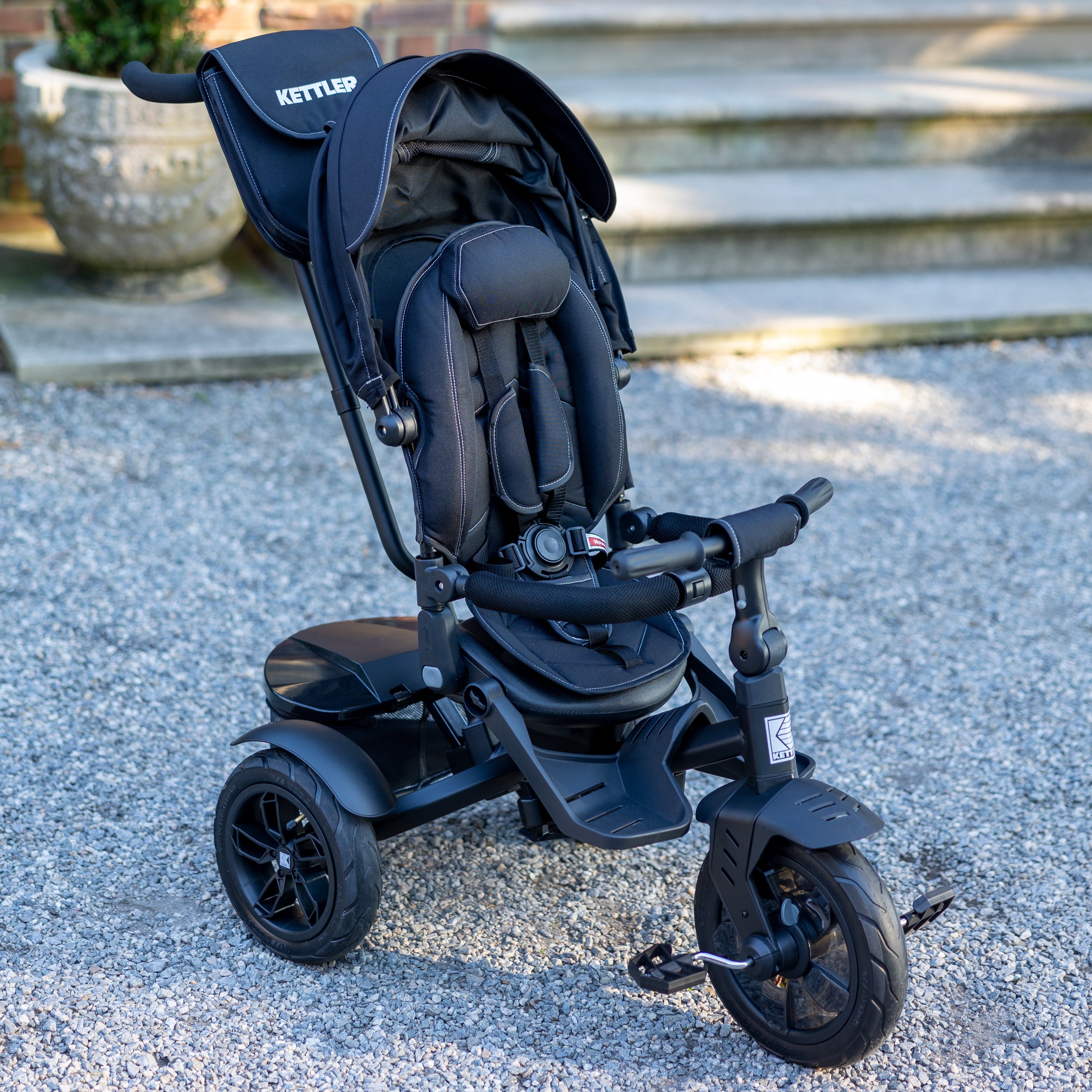 The KETTLER Air Navigator 6 in 1 Trike's function grows with your kids from 10 to 72 months. It features a rotating and reclining seat with a removable footrest and a 5-point safety harness to keep your little one safe.  You can put diapers or toys in the push bar bag and also large rear basket. The adjustable telescopic parent handle, foot brake and freewheeling function allow you to easily steer and control in the parent mode.