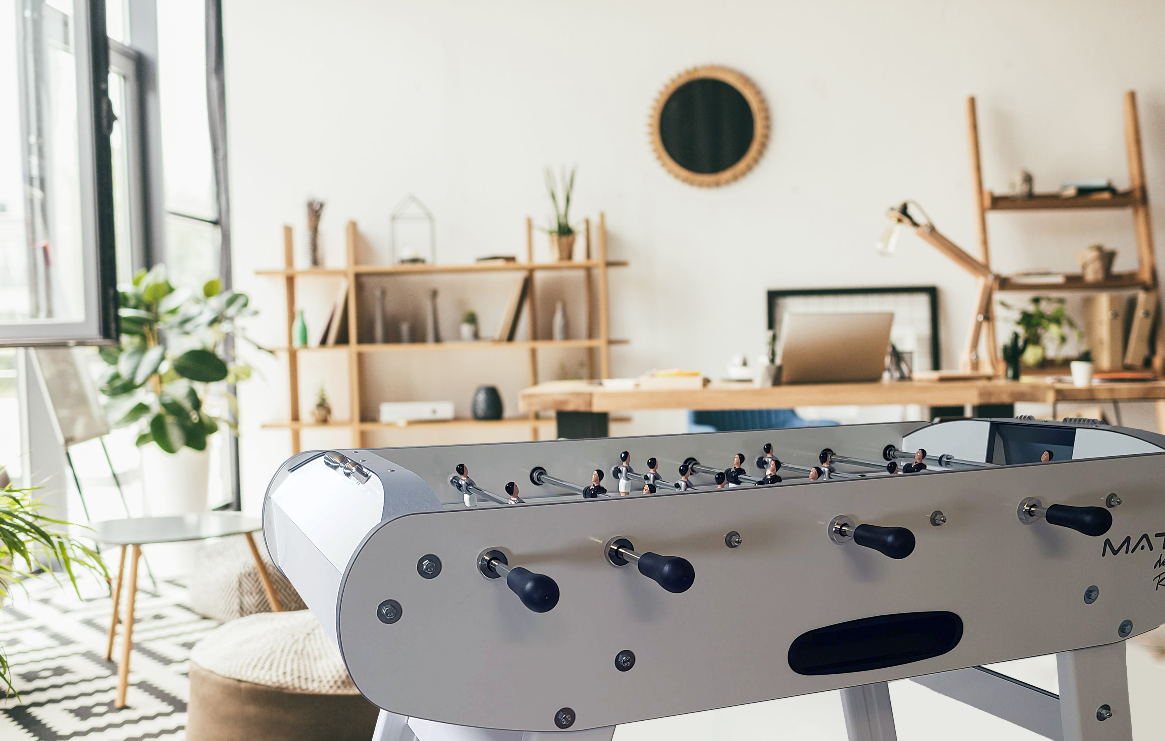 lifestyle shot in living room of french design foosball table